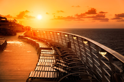Sunset over deck chairs
